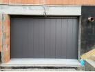 Posuvné sekcionálne garážové brány